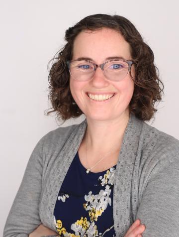 Headshot of person smiling